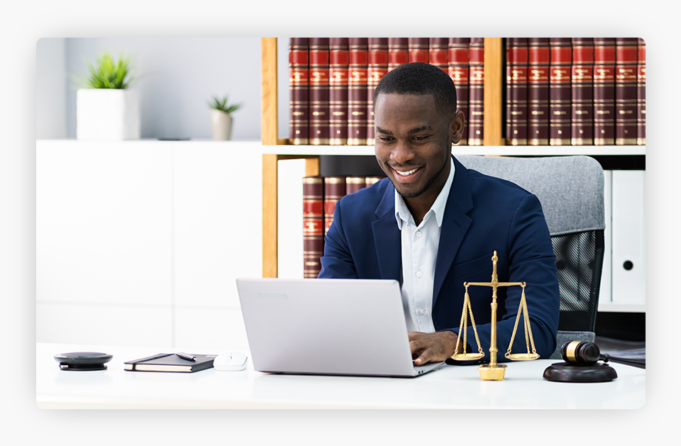Excited Young Lawyer on Computer