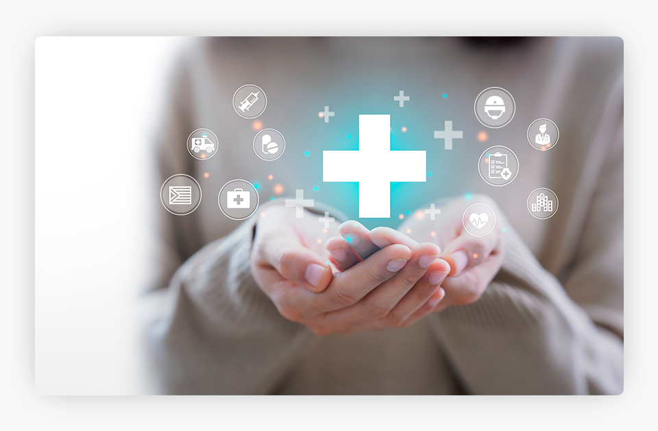 Hands holding healthcare icons