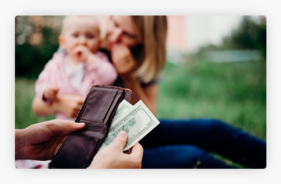 Person Checking the Money on the Wallet