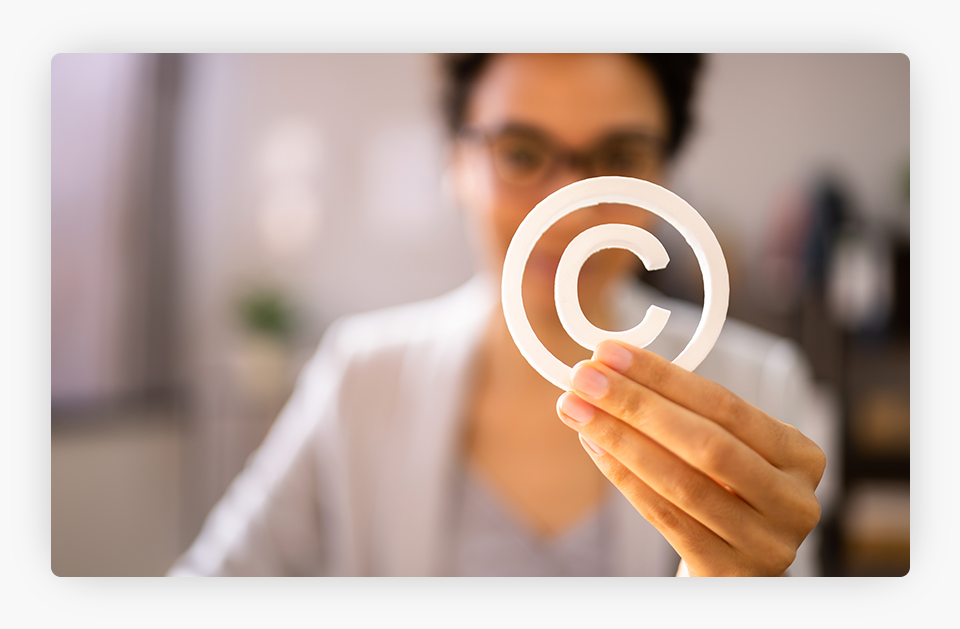 Person Holding the Copyright Symbol