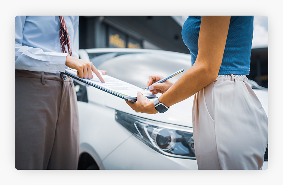 Young businesswoman exploring car insurance options.