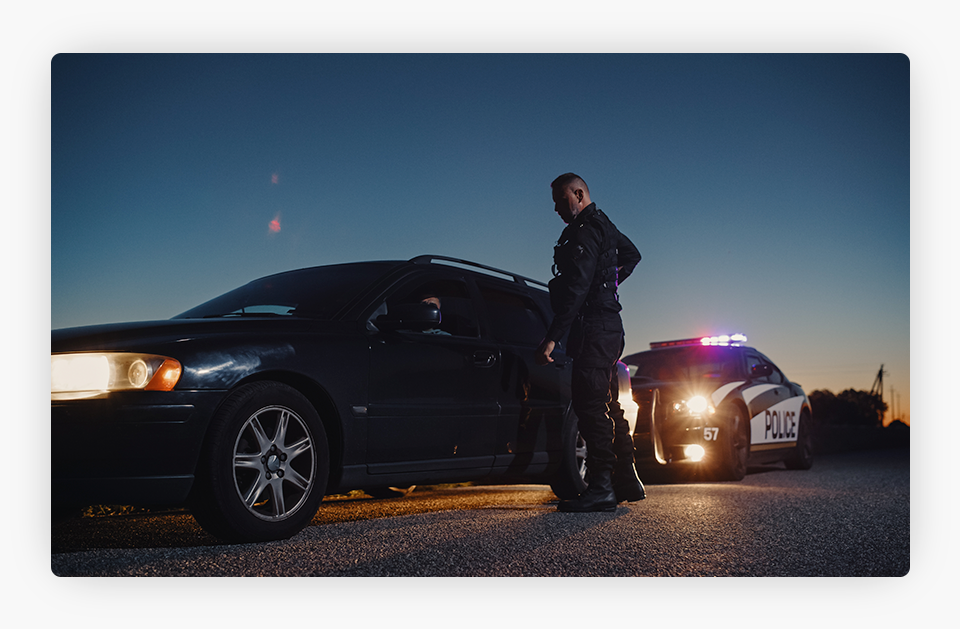 Cop approaching to a pulled over car